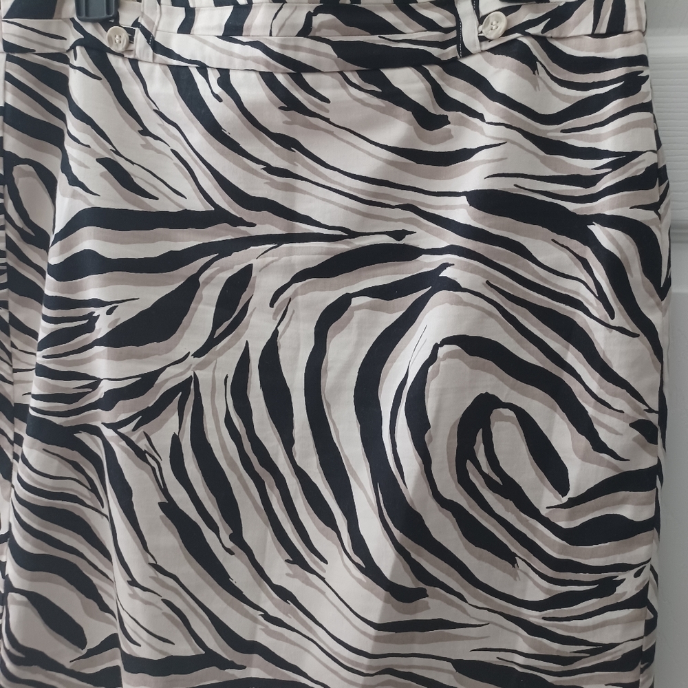 Ladies skirt from Loft fully lined. Leppard pattern size 8.